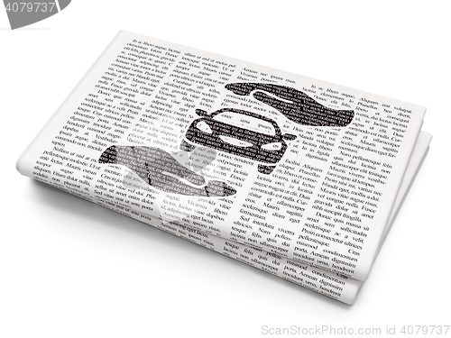 Image of Insurance concept: Car And Palm on Newspaper background