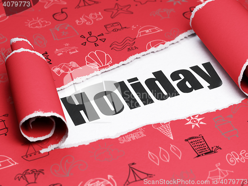 Image of Vacation concept: black text Holiday under the piece of  torn paper