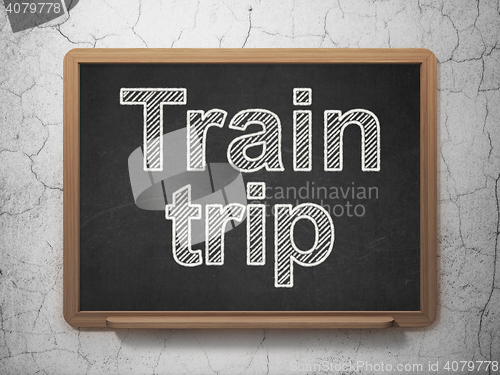 Image of Vacation concept: Train Trip on chalkboard background