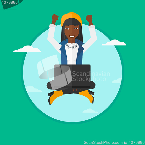 Image of Woman sitting on cloud with laptop.
