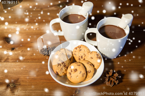 Image of cups of hot chocolate with marshmallow and cookies