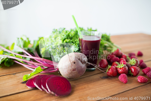 Image of glass of beetroot juice, fruits and vegetables