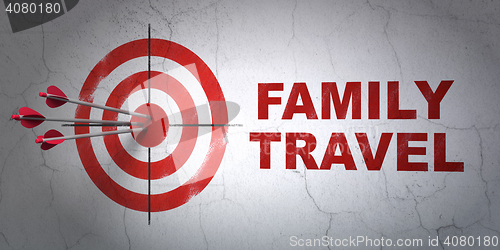 Image of Vacation concept: target and Family Travel on wall background