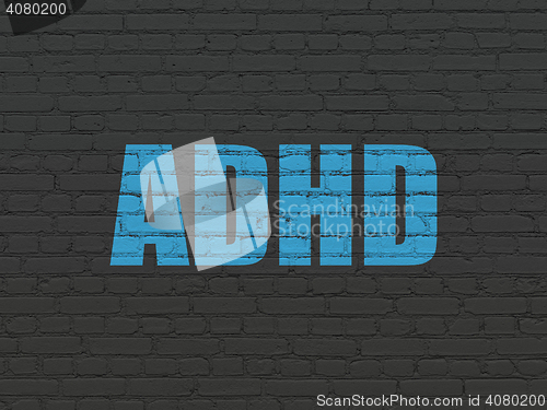 Image of Health concept: ADHD on wall background