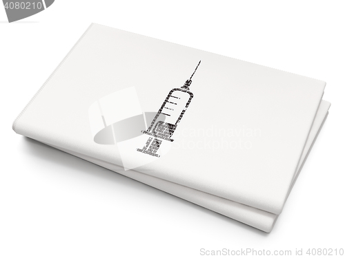 Image of Health concept: Syringe on Blank Newspaper background
