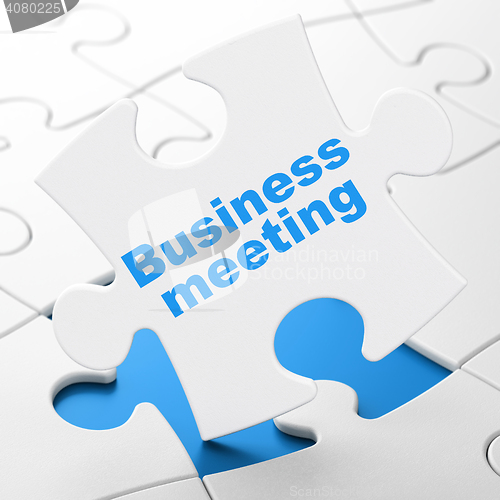 Image of Business concept: Business Meeting on puzzle background