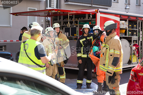 Image of Firefighters getting ready to intervene on chemical accident location.