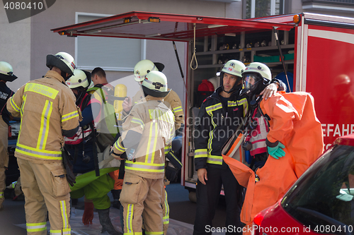 Image of Firefighters getting ready to intervene on chemical accident location.