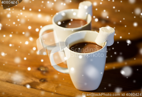 Image of cups of hot chocolate with marshmallow on wood