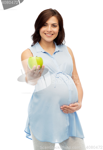 Image of happy pregnant woman holding green apple