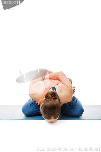 Image of Woman doing asana Yoga mudrasana