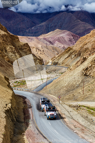 Image of Indian lorry trucks on highway in Himalayas. Ladakh, India