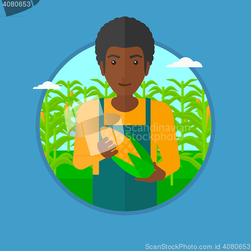 Image of Farmer holding corn vector illustration.