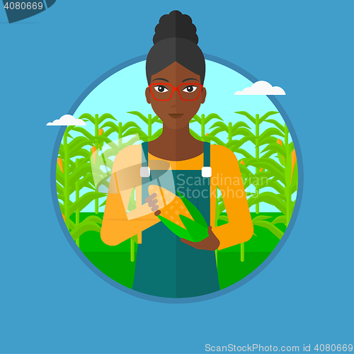 Image of Farmer holding corn vector illustration.