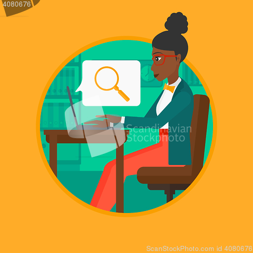 Image of Business woman working on her laptop.