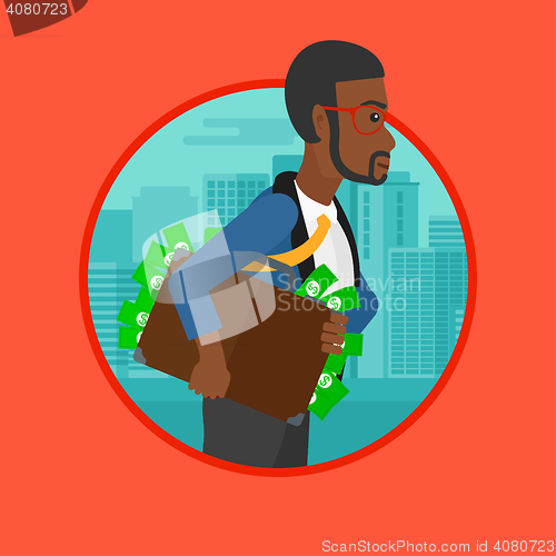 Image of Businessman carrying briefcase full of money.