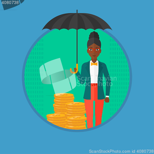 Image of Woman with umbrella protecting money.