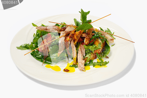 Image of Pumpkin salad with crispy duck and greens