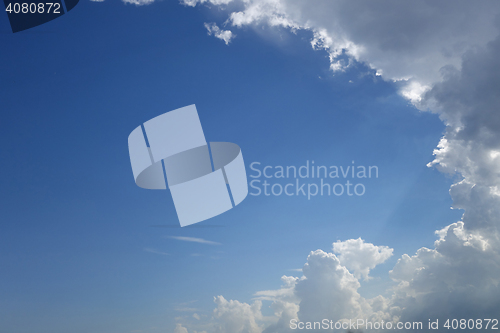 Image of Blue sky with rain clouds