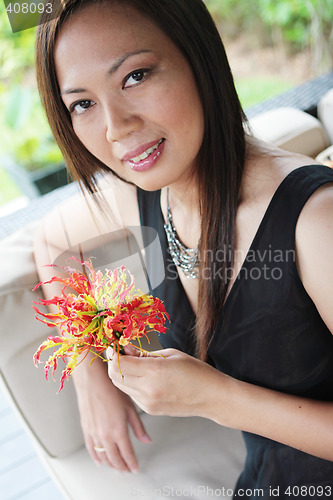 Image of Woman with flowers