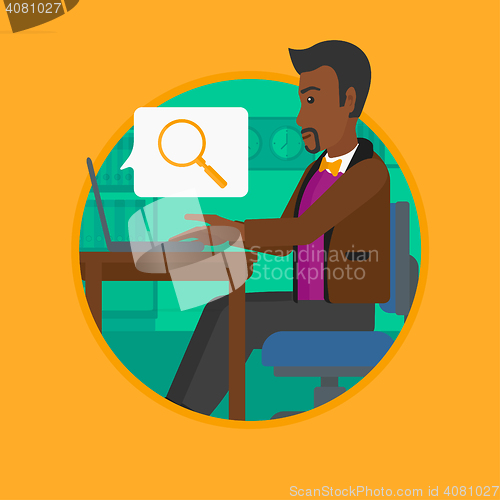 Image of Businessman working on his laptop.
