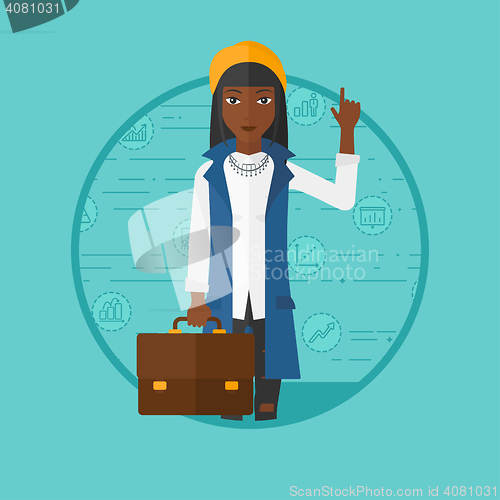 Image of Business woman pointing at cogwheels.