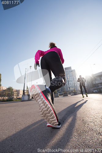 Image of young  couple jogging