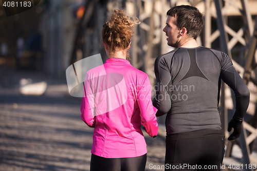 Image of young  couple jogging