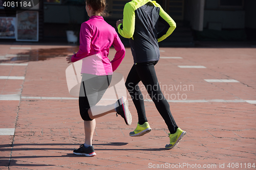 Image of young  couple jogging