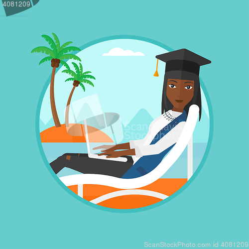 Image of Graduate lying in chaise lounge with laptop.