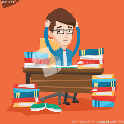 Image of Student sitting at the table with piles of books.