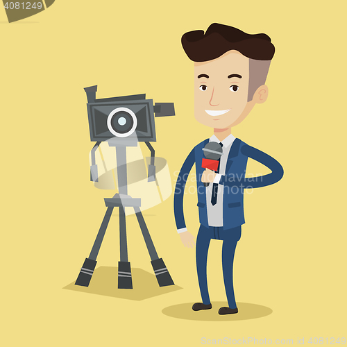 Image of TV reporter with microphone and camera.