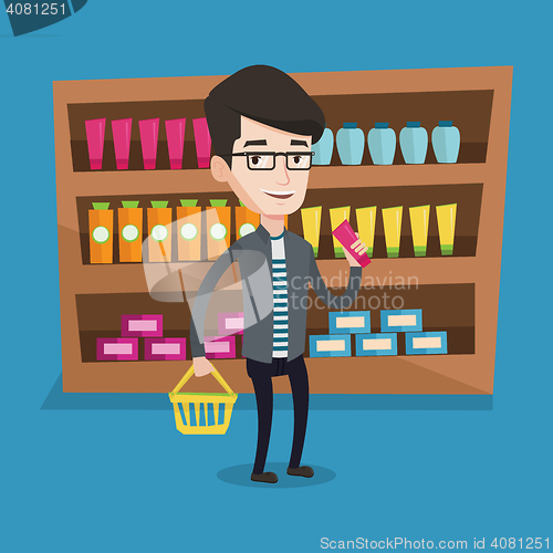 Image of Customer with shopping basket and tube of cream.