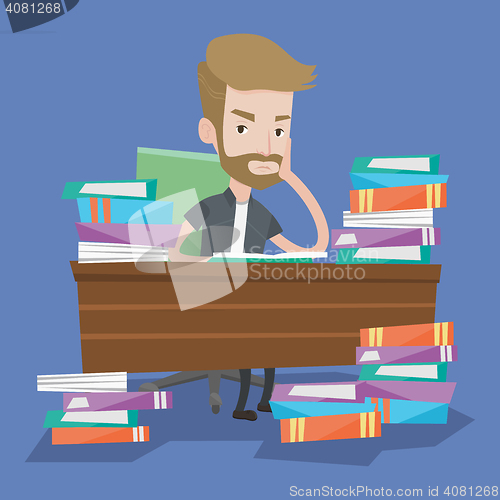 Image of Student sitting at the table with piles of books.