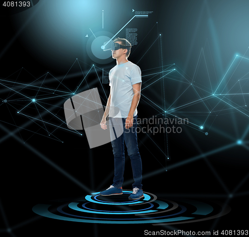 Image of happy man in virtual reality headset or 3d glasses