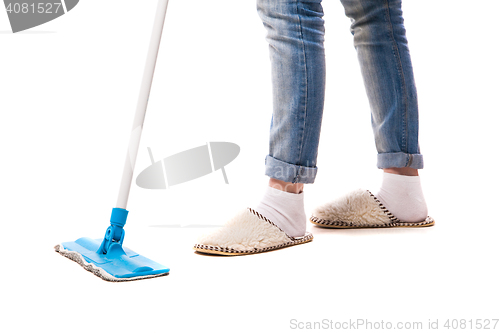 Image of Cleaning floor with mop.