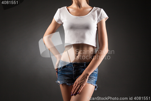 Image of Slim girl posing faceless.