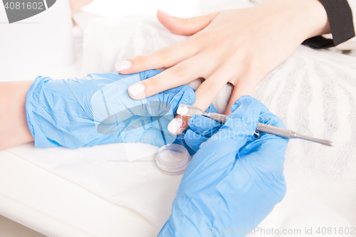 Image of Specialist making manicure