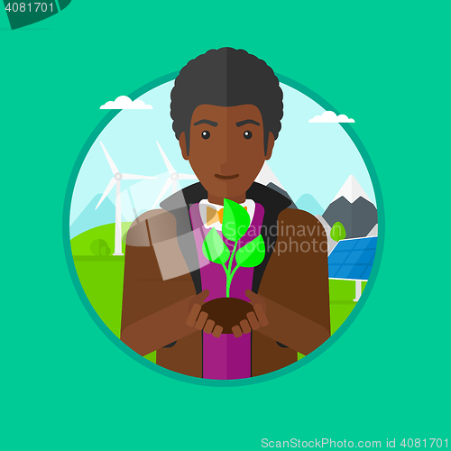 Image of Man holding green small plant vector illustration.