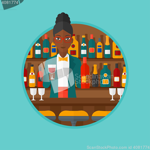 Image of Bartender standing at the bar counter.