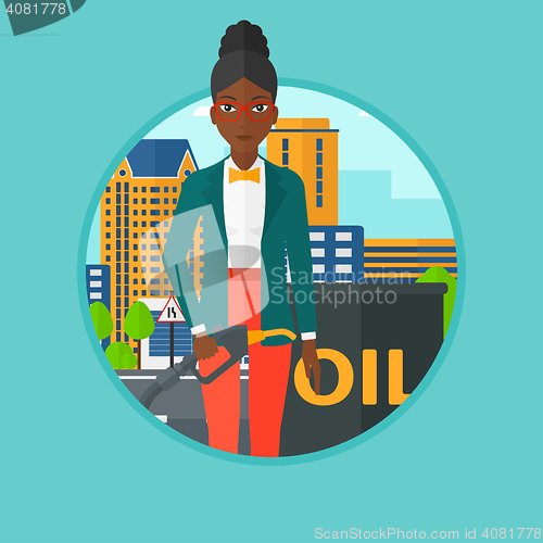 Image of Woman with oil barrel and gas pump nozzle.