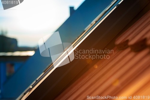 Image of Roof tile over blue sky