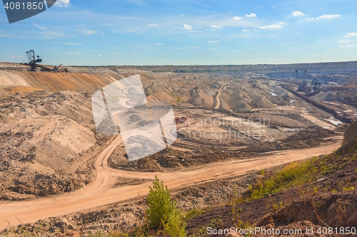 Image of Large excavation site with roads ahead