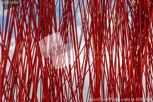 Image of Red sticks in motion