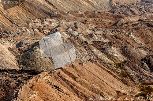 Image of Large excavation site with heaps of sand