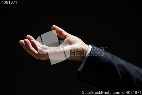 Image of close up of businessman with empty hand