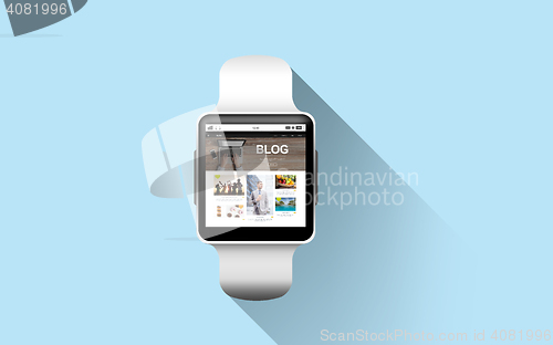 Image of close up of smart watch with blog page on screen