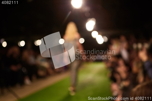 Image of Fashion runway out of focus. The blur background