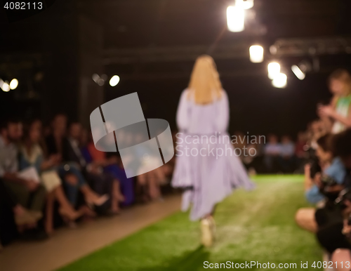 Image of Fashion runway out of focus. The blur background