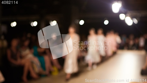 Image of Fashion runway out of focus. The blur background